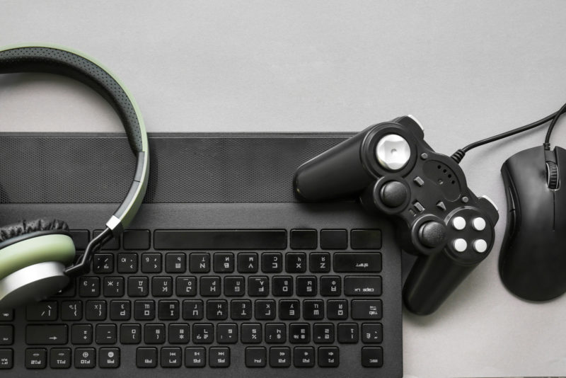 Modern gaming accessories on grey background