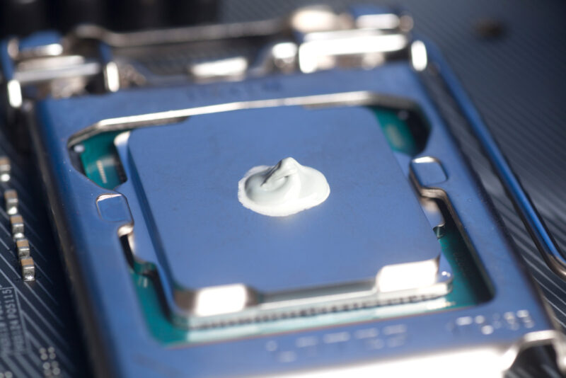 CPU with thermal paste applied. Close up.
